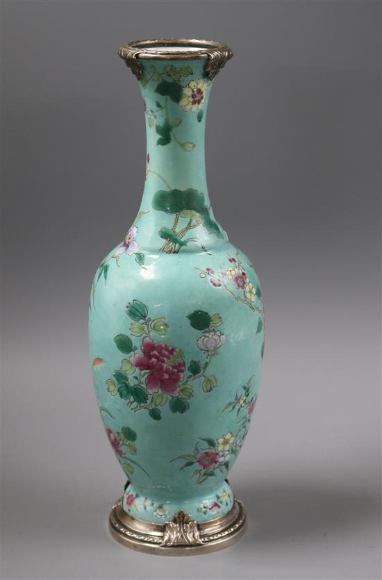 A Chinese dynasty famille rose turquoise ground vase with silver mounts H.29.5cm